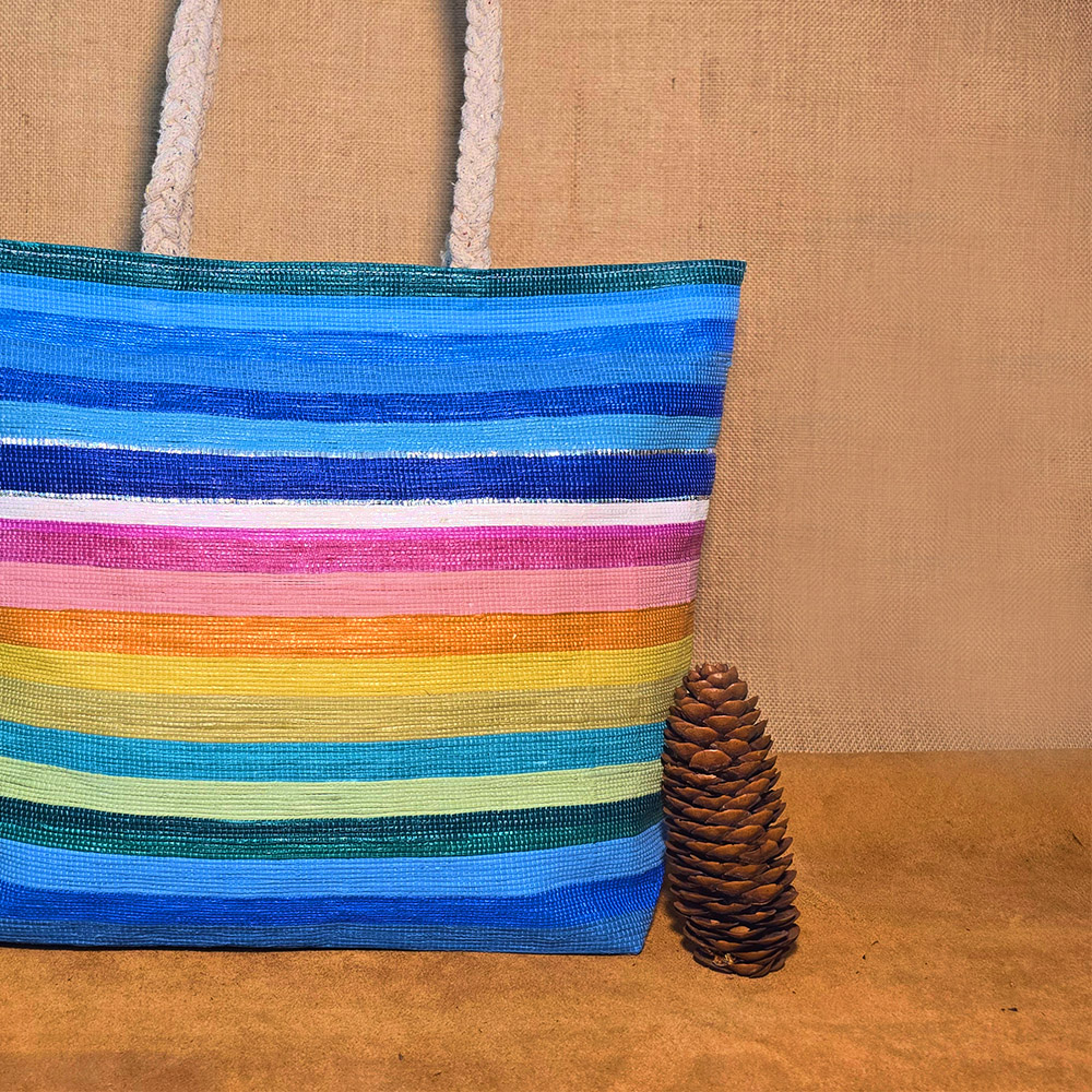 Rajiben- Blue Rainbow Horizontal Stripe Upcycled Plastic Handwoven Rectangular Shoulder Bag - Image 2