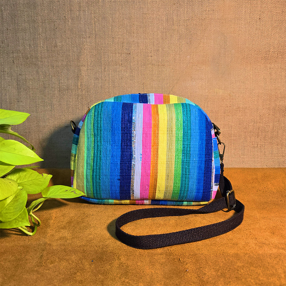 Rajiben- Rainbow Upcycled Plastic Handwoven Sling Bag - Image 2