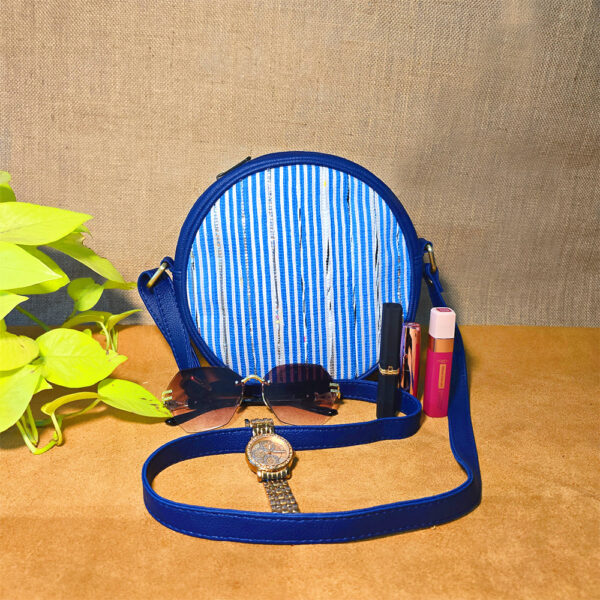 Rajiben- Blue & white strip Upcycled Plastic Handwoven circular Sling Bag