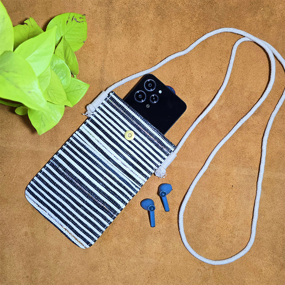 Rajiben- Black & White Horizontal strip Upcycled Plastic Handwoven Mobile Sling Bag - Image 2