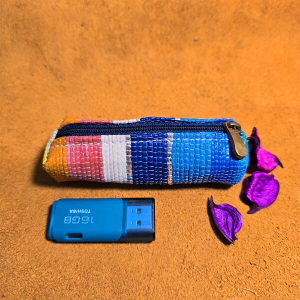 Rajiben- Multicolour strip Upcycled Plastic Handwoven Pen Drive Case