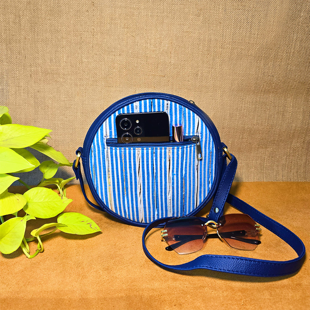 Rajiben- Blue & white strip Upcycled Plastic Handwoven circular Sling Bag - Image 3