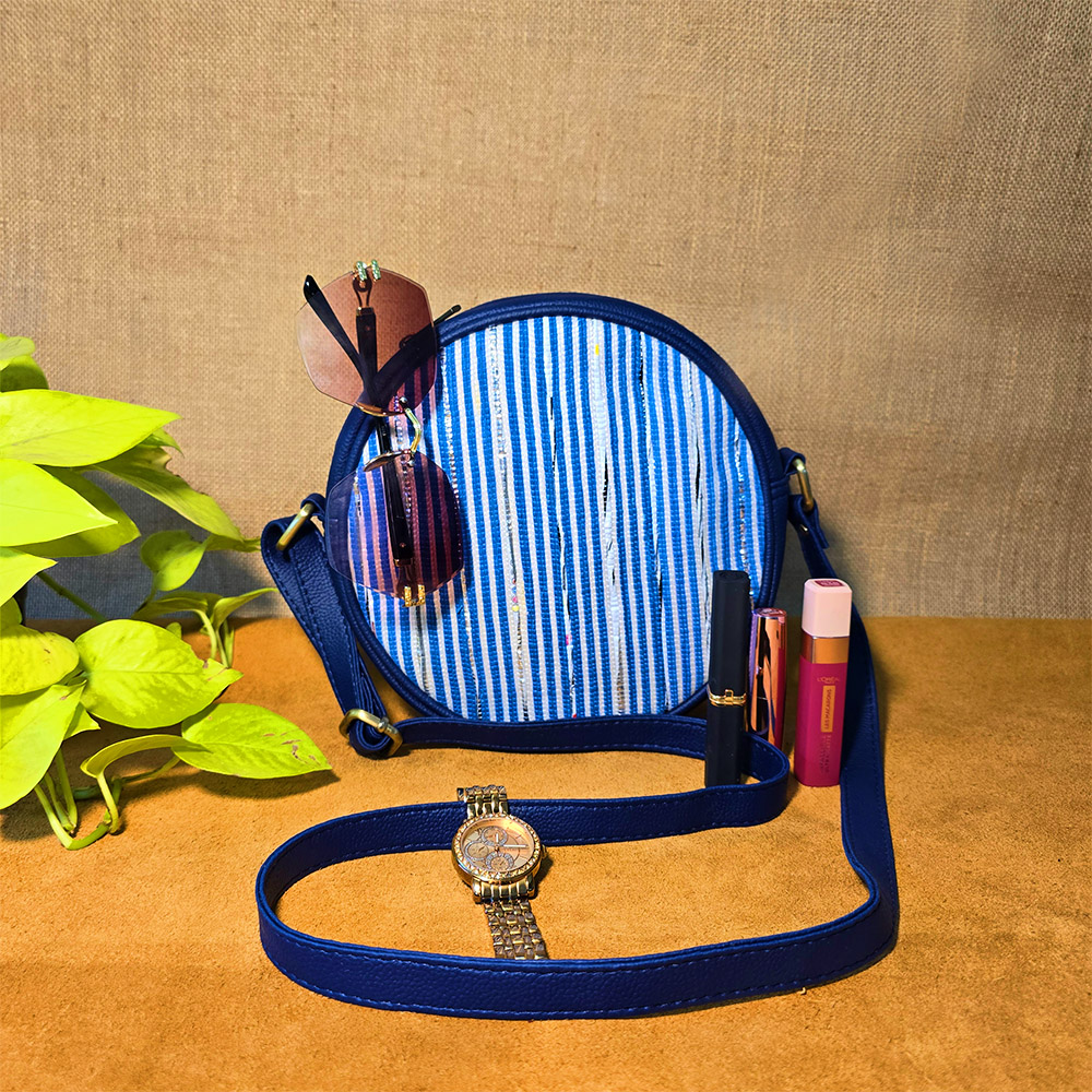 Rajiben- Blue & white strip Upcycled Plastic Handwoven circular Sling Bag - Image 2