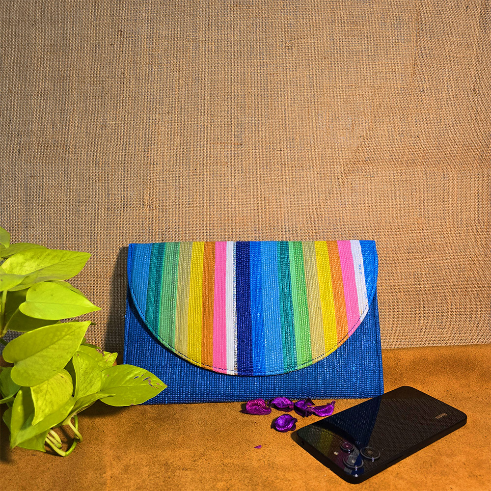 Rajiben- Rainbow Stripe Upcycled Plastic Handwoven Clutch - Image 3