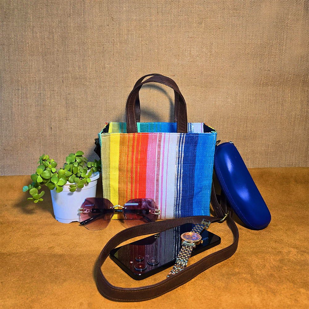 Rajiben- Multicolour strip Upcycled Plastic Handwoven Square Sling Bag