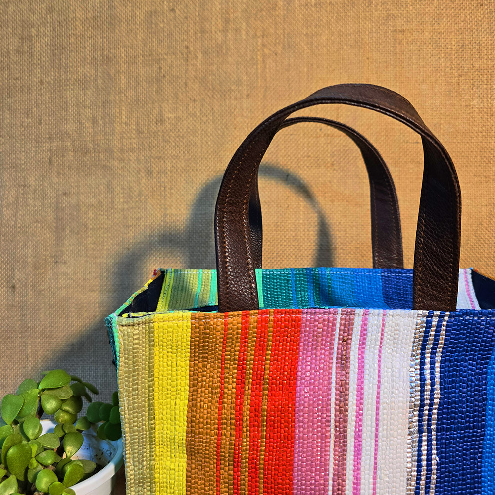 Rajiben- Multicolour strip Upcycled Plastic Handwoven Square Sling Bag - Image 2