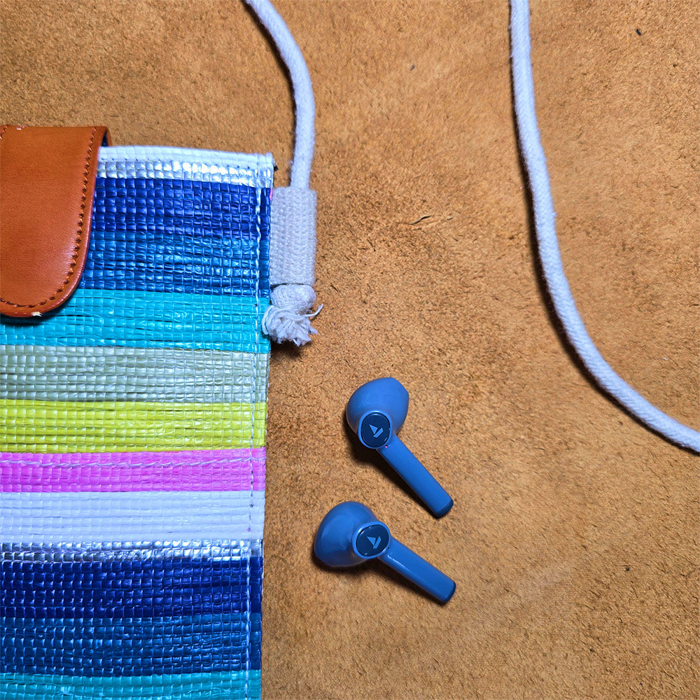 Rajiben- Multicolour strip Upcycled Plastic Handwoven Mobile Sling Bag - Image 2