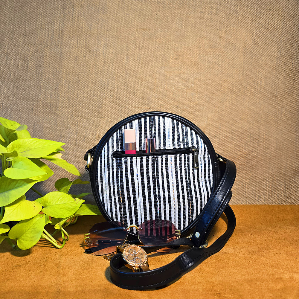 Rajiben- Black & white strip Upcycled Plastic Handwoven circular Sling Bag - Image 2
