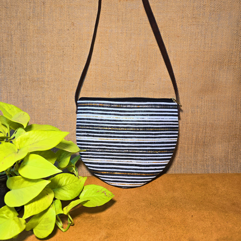 Rajiben- Black & White Stripe Upcycled Plastic Handwoven Half Moon Sling Bag - Image 2
